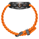 Samsung Galaxy Watch Ultra gris titane avec son bracelet orange, vue de profil